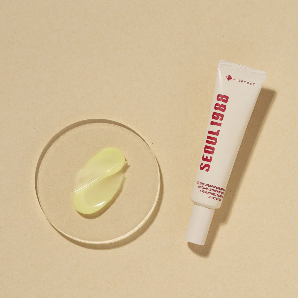 KSECRET - SEOUL 1988 Eye Cream : Retinal Liposome + 4 Fermented Bean tube on beige background with product swatch. 